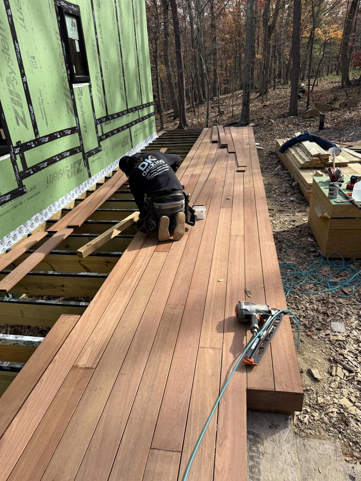 DecKing crew installing exotic hardwood decking